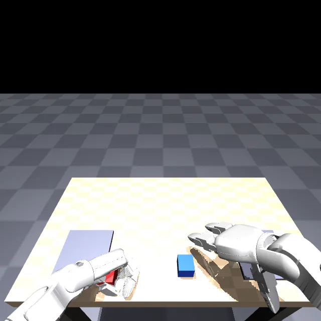 ロボット頭部カメラから見た、左手を赤いブロックへ伸ばす場面